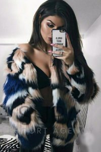 Cara in fur coat